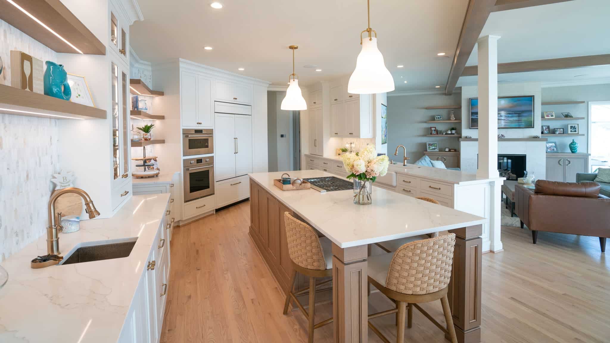 Gourmet kitchen with custom cabinetry, stone countertops, and professional appliances