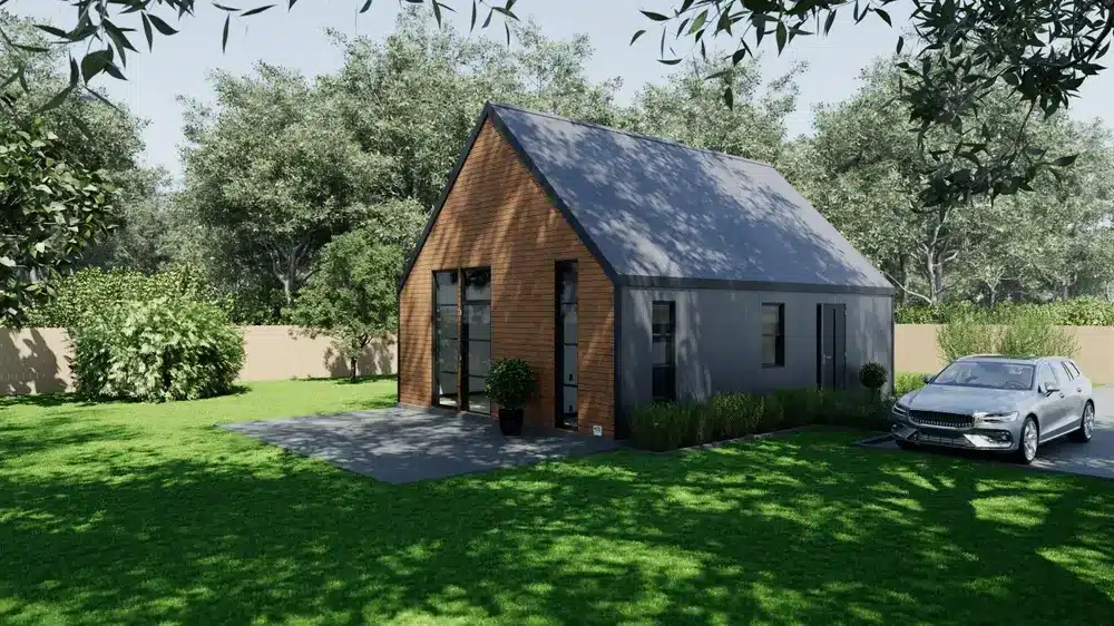 Modern detached backyard in-law suite cottage with wood and grey siding, gabled roof, and adjacent parking space.